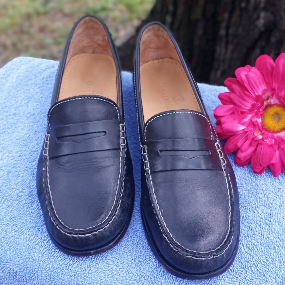 Cole Haan black loafers with white stitching